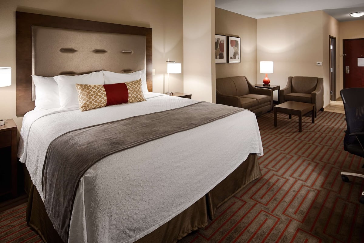 pillow-top beds, desk, laptop workspace, blackout curtains