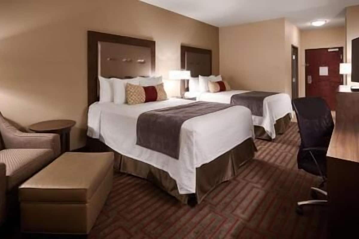 Pillow-top beds, desk, laptop workspace, blackout curtains
