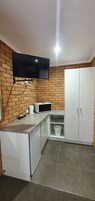 Quarto standard | Roupas de cama premium, espaço de trabalho para notebook