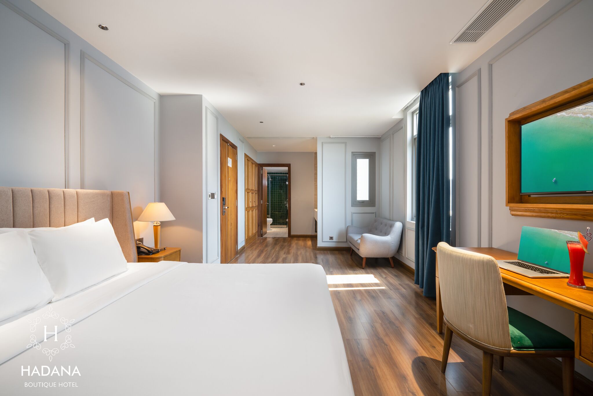 junior family suite | in-room safe, desk, laptop workspace, blackout curtains