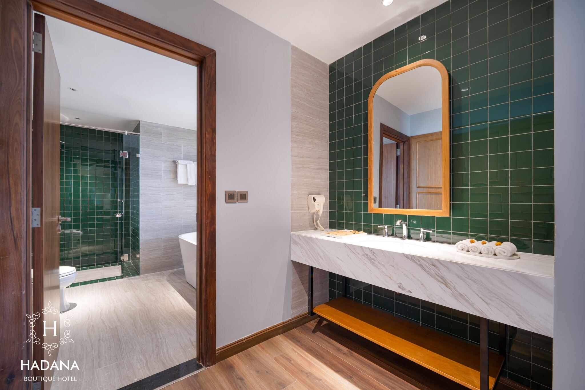 junior family suite | bathroom | hair dryer, bathrobes, slippers, towels