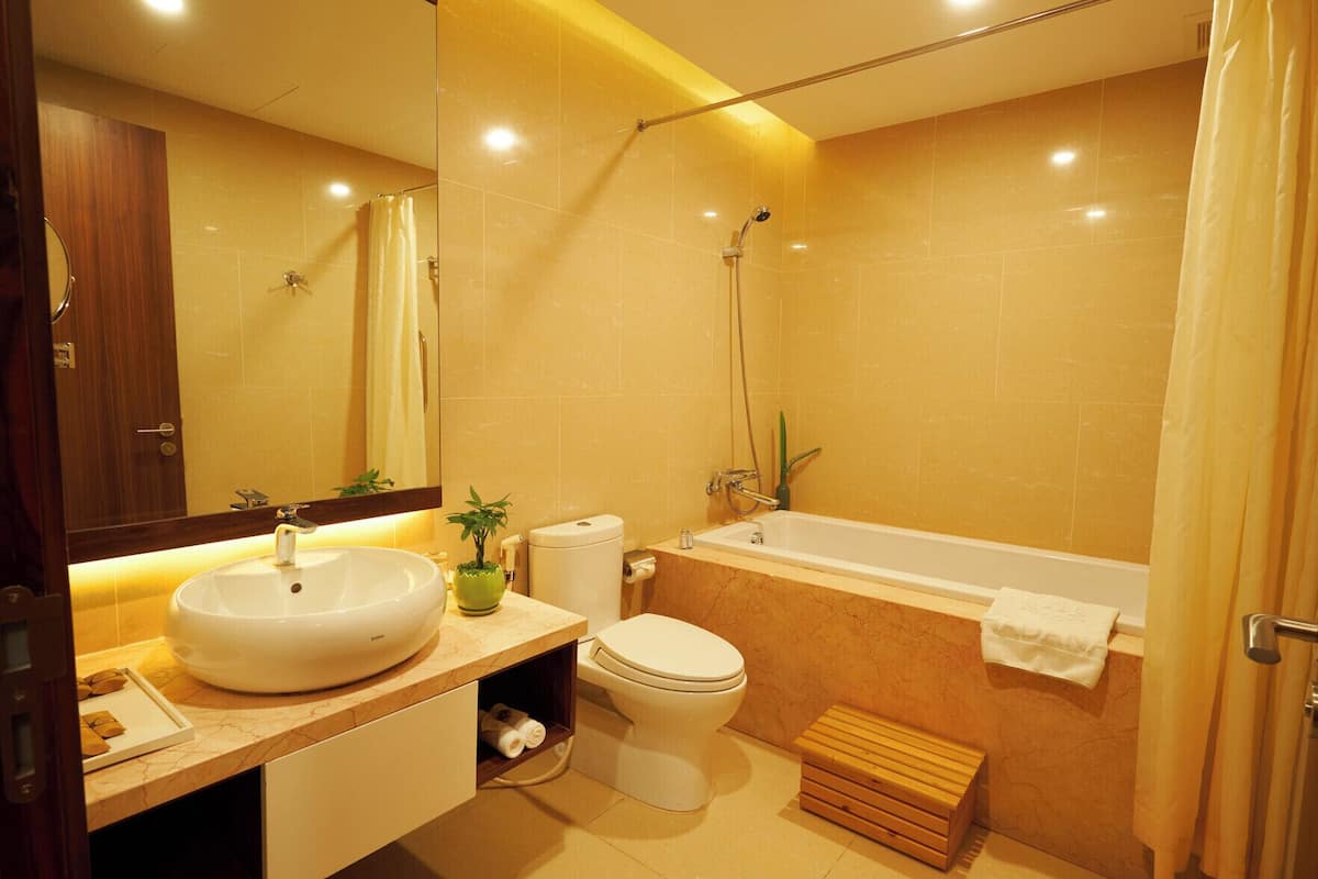 Bathroom | Hair dryer, bathrobes, slippers, towels