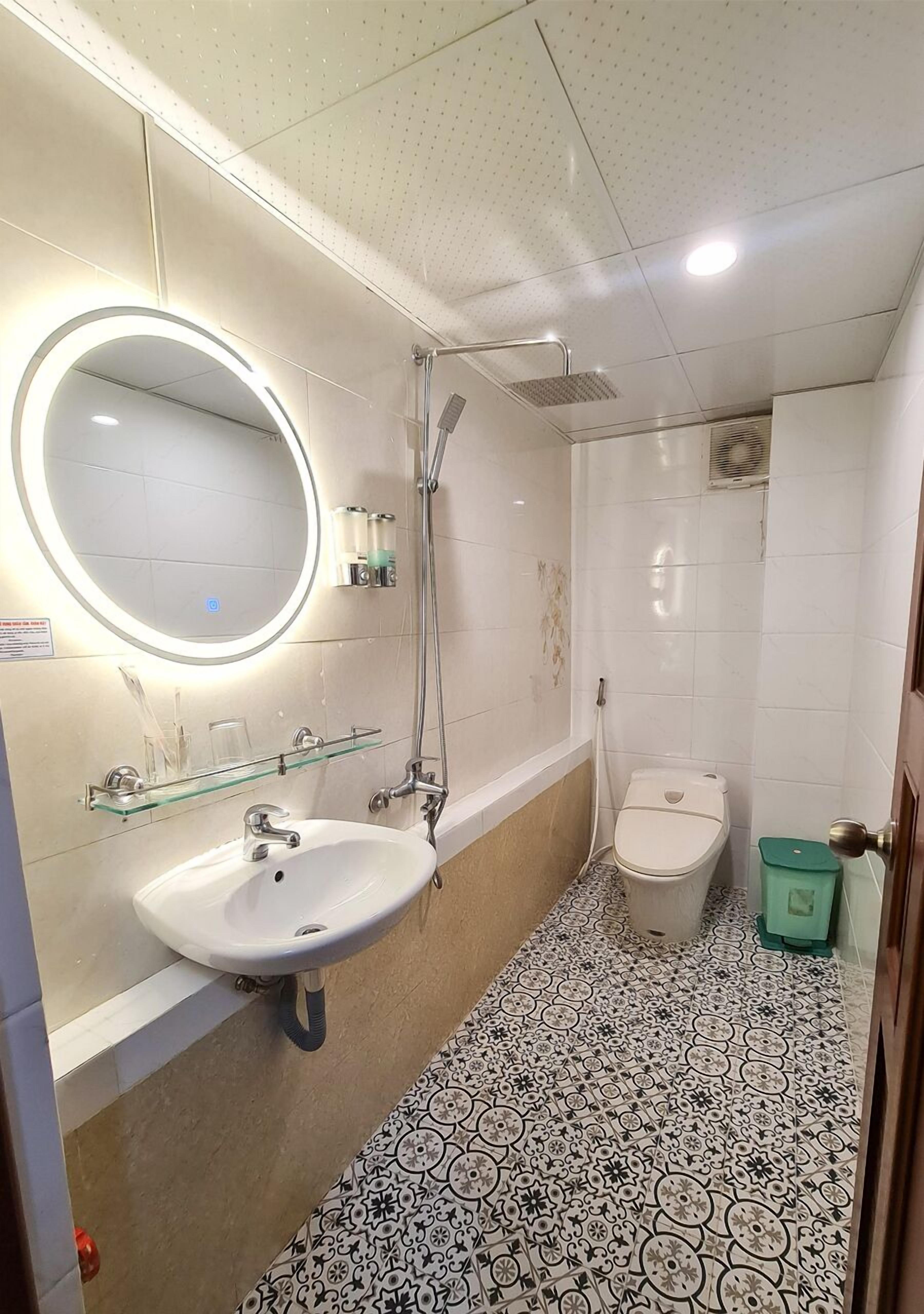 family quadruple room, 2 double beds, smoking, garden view | bathroom | shower, free toiletries, slippers, towels