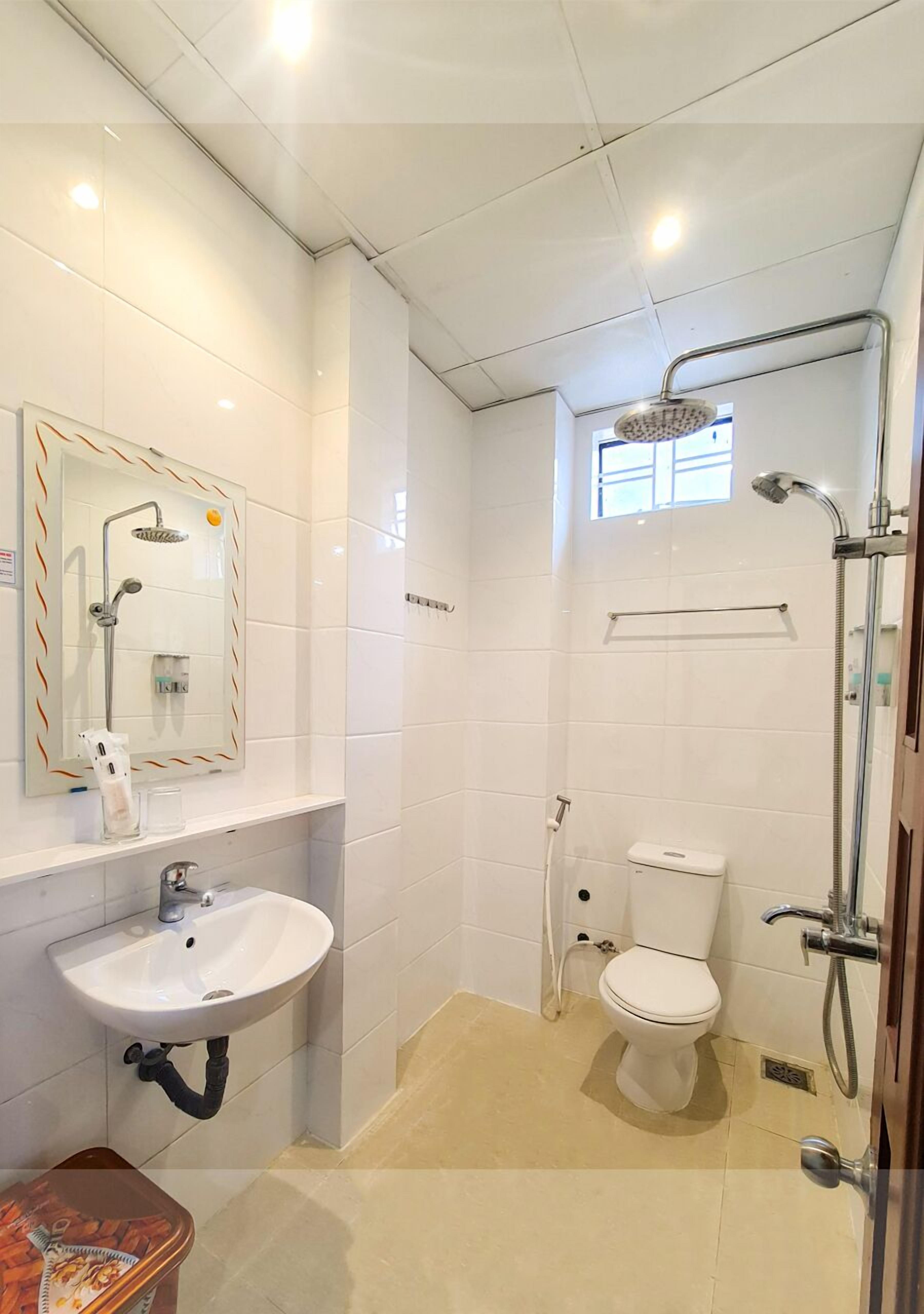 family shared dormitory, multiple beds, non smoking, garden view | bathroom | shower, free toiletries, slippers, towels