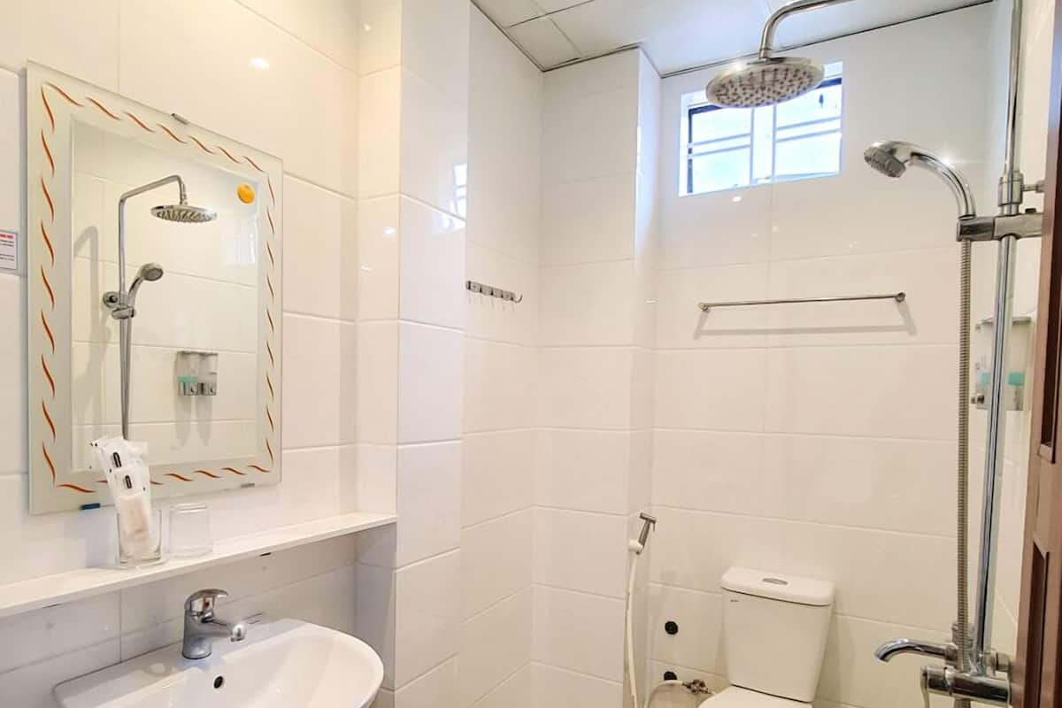 family shared dormitory, multiple beds, non smoking, garden view | bathroom | shower, free toiletries, slippers, towels