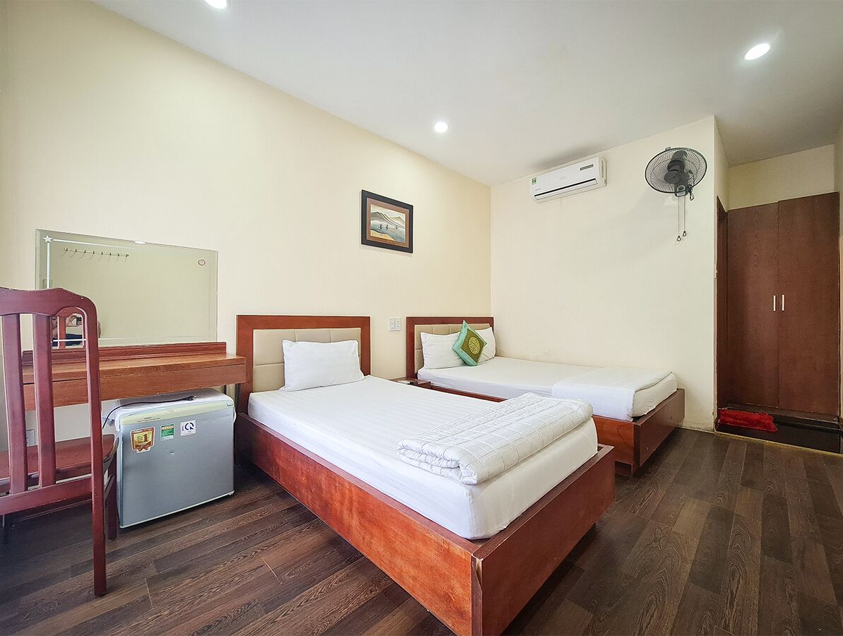 standard triple room, multiple beds, non smoking, garden view | minibar, in-room safe, desk, free wifi