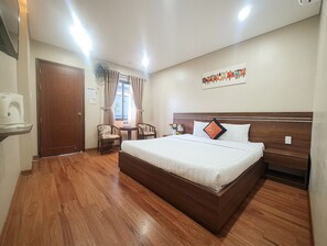 Habitación Deluxe | Minibar, caja de seguridad en la habitación, escritorio y wifi gratis