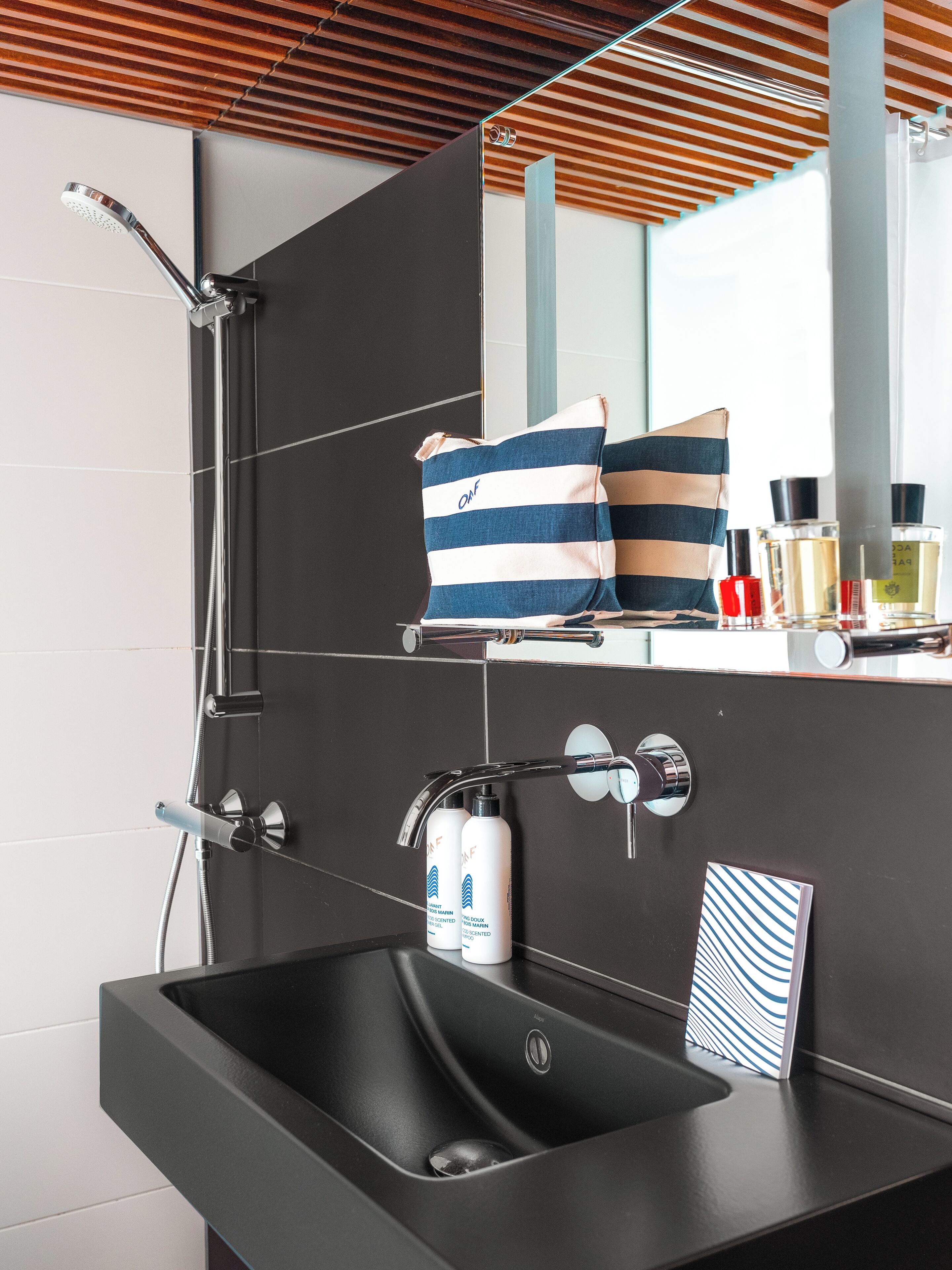 seine view | bathroom | rainfall showerhead, free toiletries, hair dryer, towels