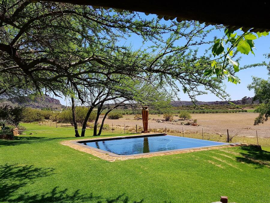 Cottage, Fireplace, Pool View (Waboomhuys) | Garden view