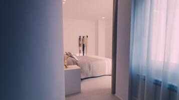 Chambre Deluxe | Draps italiens Frette, literie de qualité supérieure