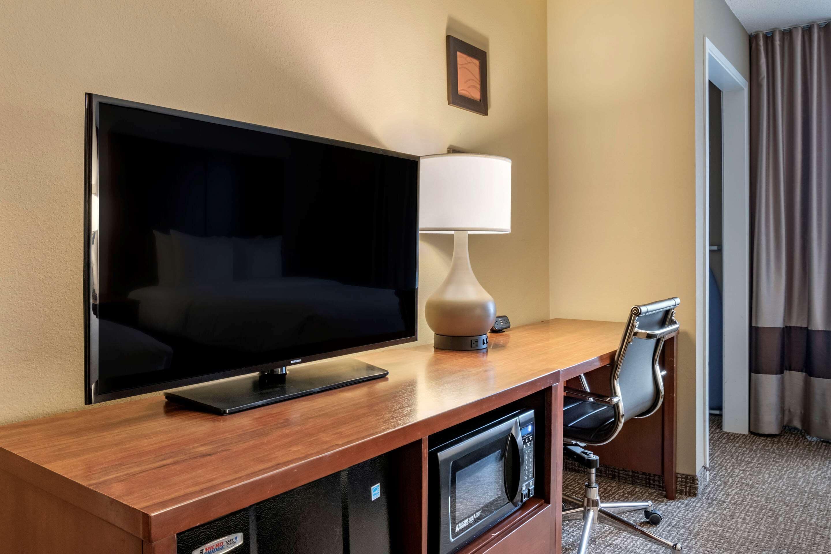 desk, blackout curtains, iron/ironing board, free cots/infant beds