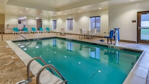 A swimming pool with lounge chairs and a changing area. - Comfort Inn PA Turnpike - 1-81 (Carlisle)