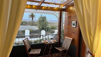 Standard Double Room, 1 Queen Bed, Non Smoking, Sea Facing | Terrace/patio