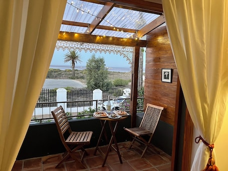 Standard Double Room, 1 Queen Bed, Non Smoking, Sea Facing | Terrace/patio. Goblin's Inn