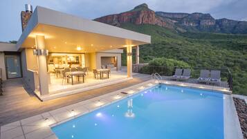 Outdoor pool, open 10:00 AM to 6:30 PM, pool umbrellas, sun loungers