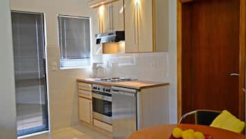 Classic Apartment (Chala-Kigi Garden Apartment) | Living area | Flat-screen TV