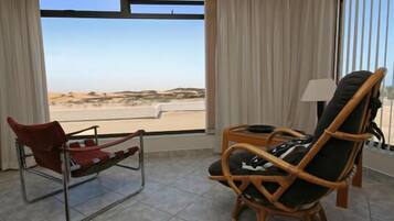 Standard Apartment (Chala-Kigi Dune View Apartment) | Living room | Flat-screen TV