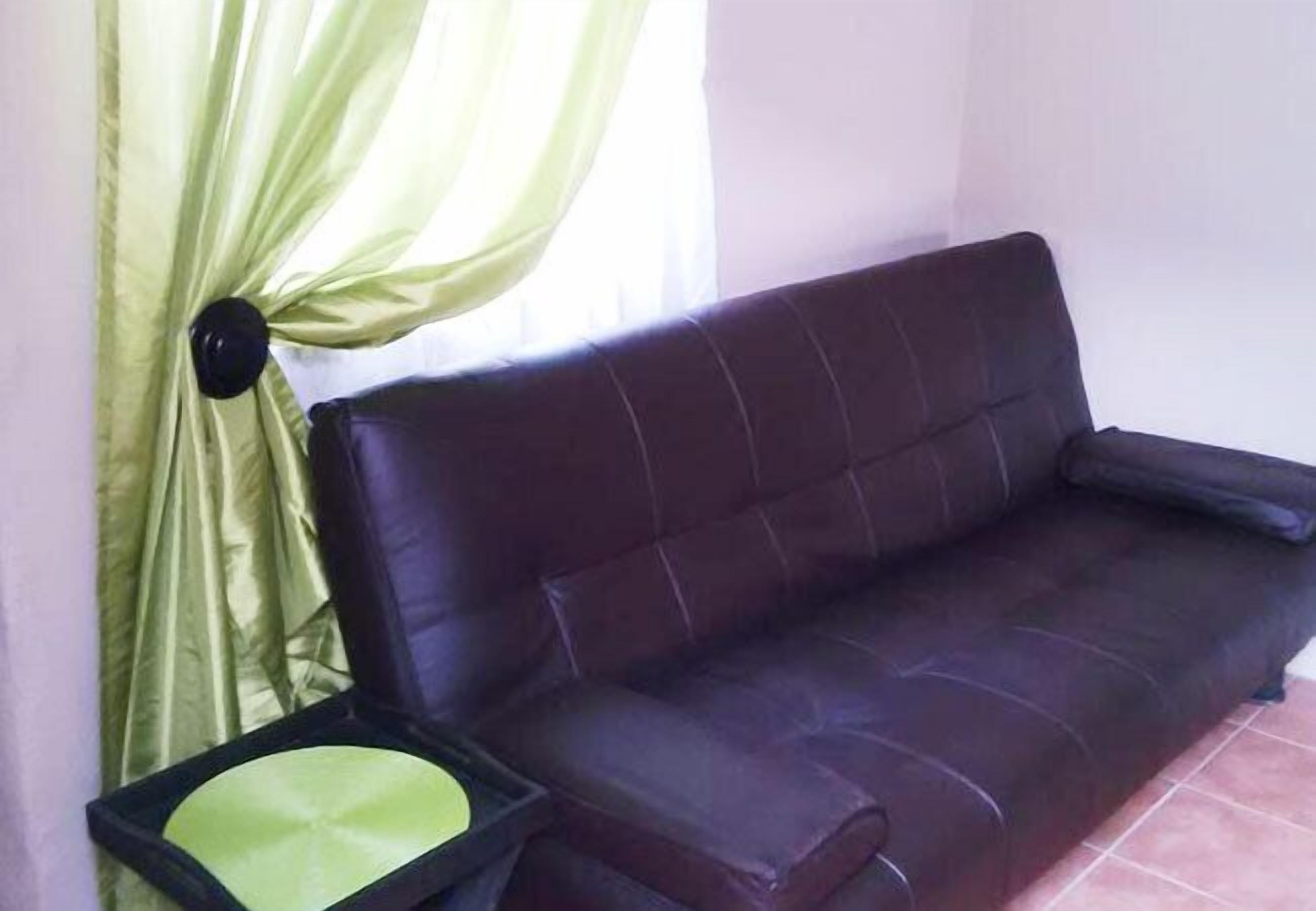 Self-Catering Garden Flat | Living area | TV