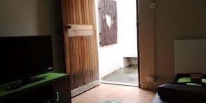 Self-Catering Garden Flat | Living area | TV