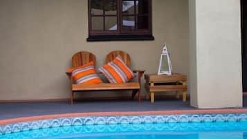 Outdoor pool, open 9:00 AM to 8:00 PM, sun loungers