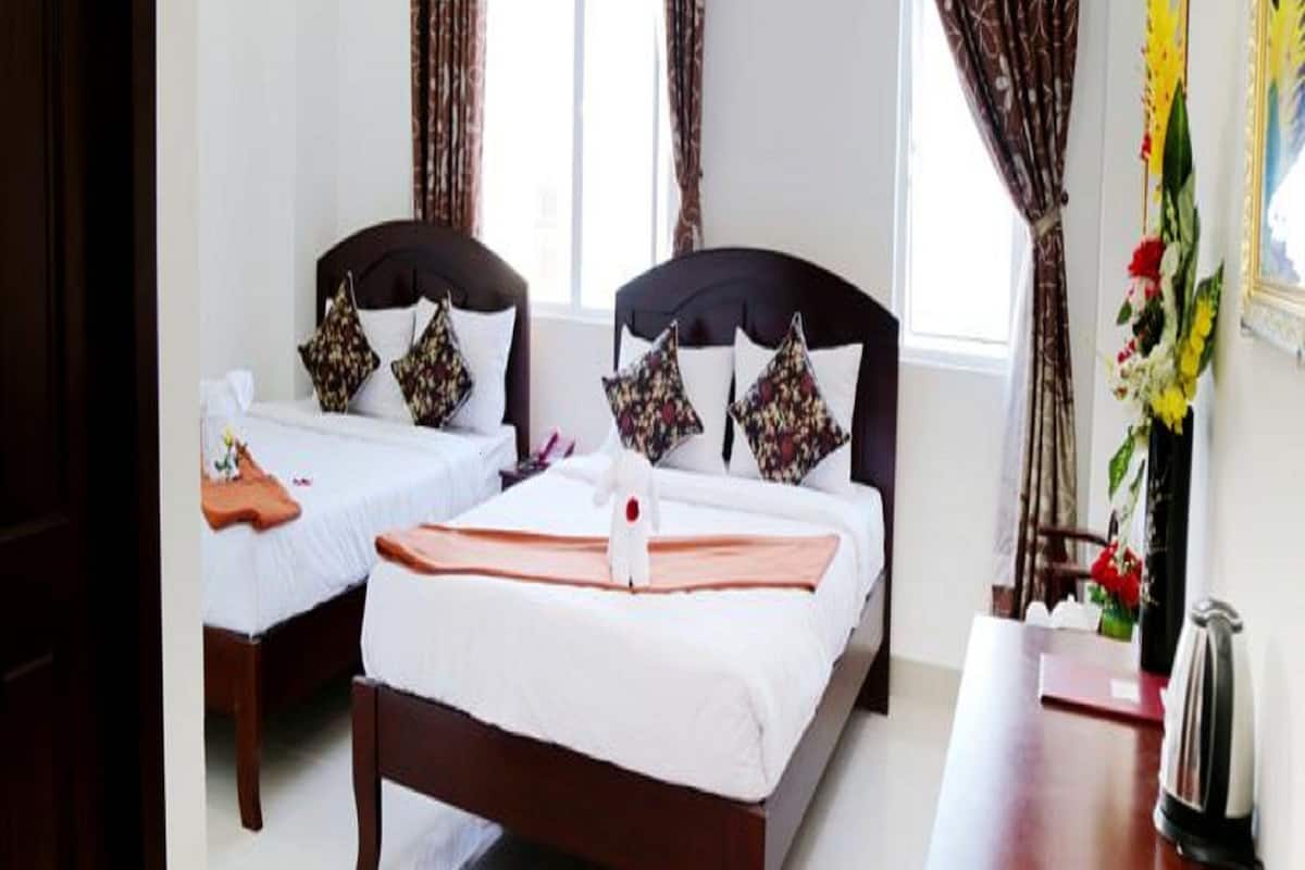 Deluxe Quadruple Room, Non Smoking, City View | Minibar, in-room safe, soundproofing, free WiFi