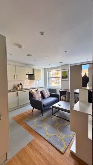 Apartment, 1 Bedroom | Living area | Flat-screen TV - Richmond Ibis House Apartments by Viridian Apartments (Richmond)