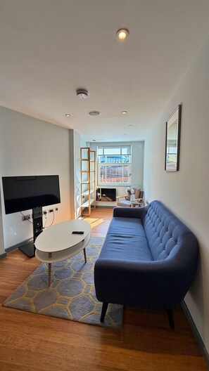 Apartment | Living area | Flat-screen TV - Richmond Ibis House Apartments by Viridian Apartments (Richmond)