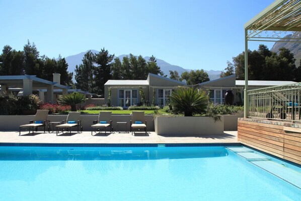 2 outdoor pools, pool umbrellas, sun loungers