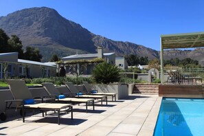 2 outdoor pools, pool umbrellas, sun loungers