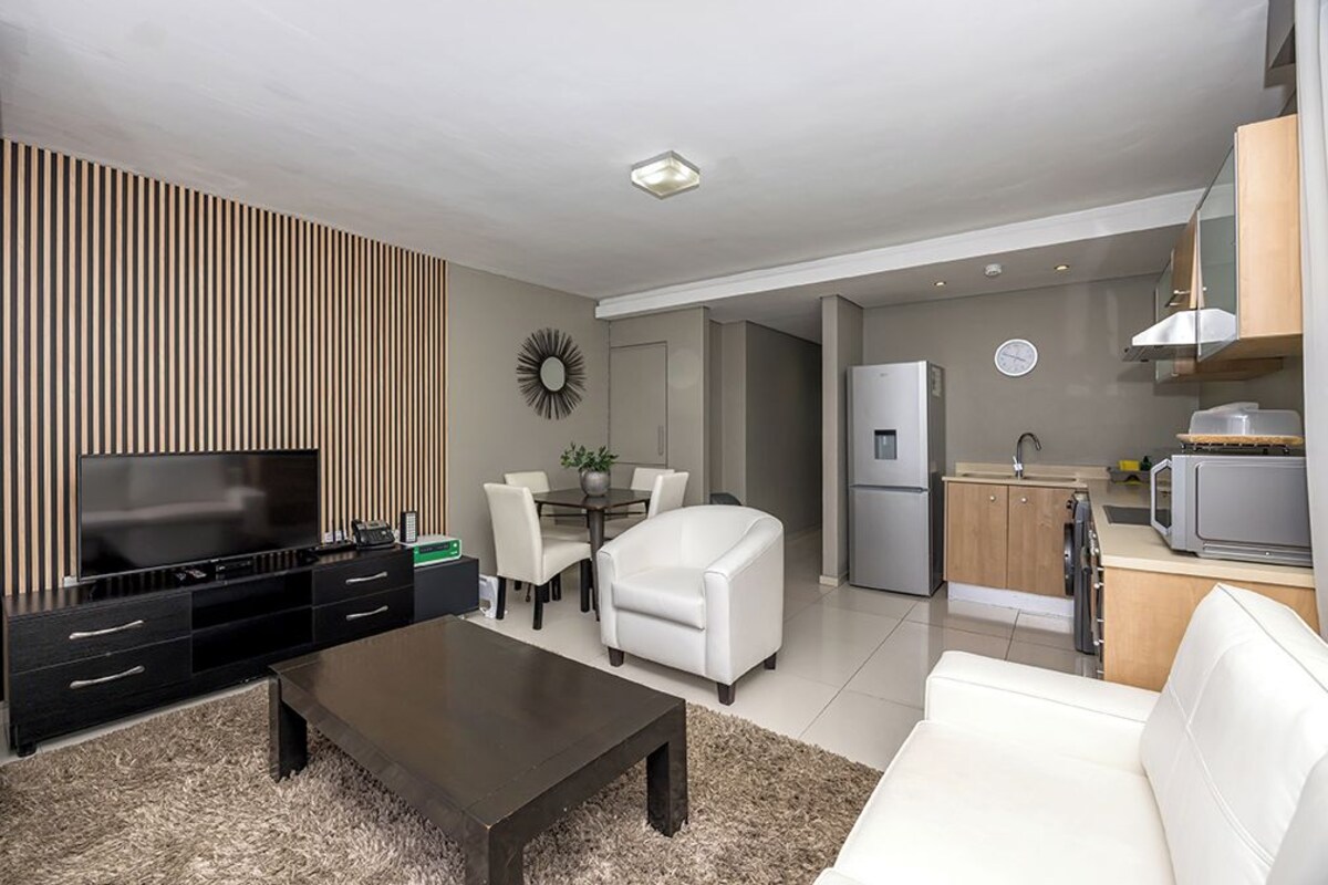 Standard Apartment | Living area | Flat-screen TV