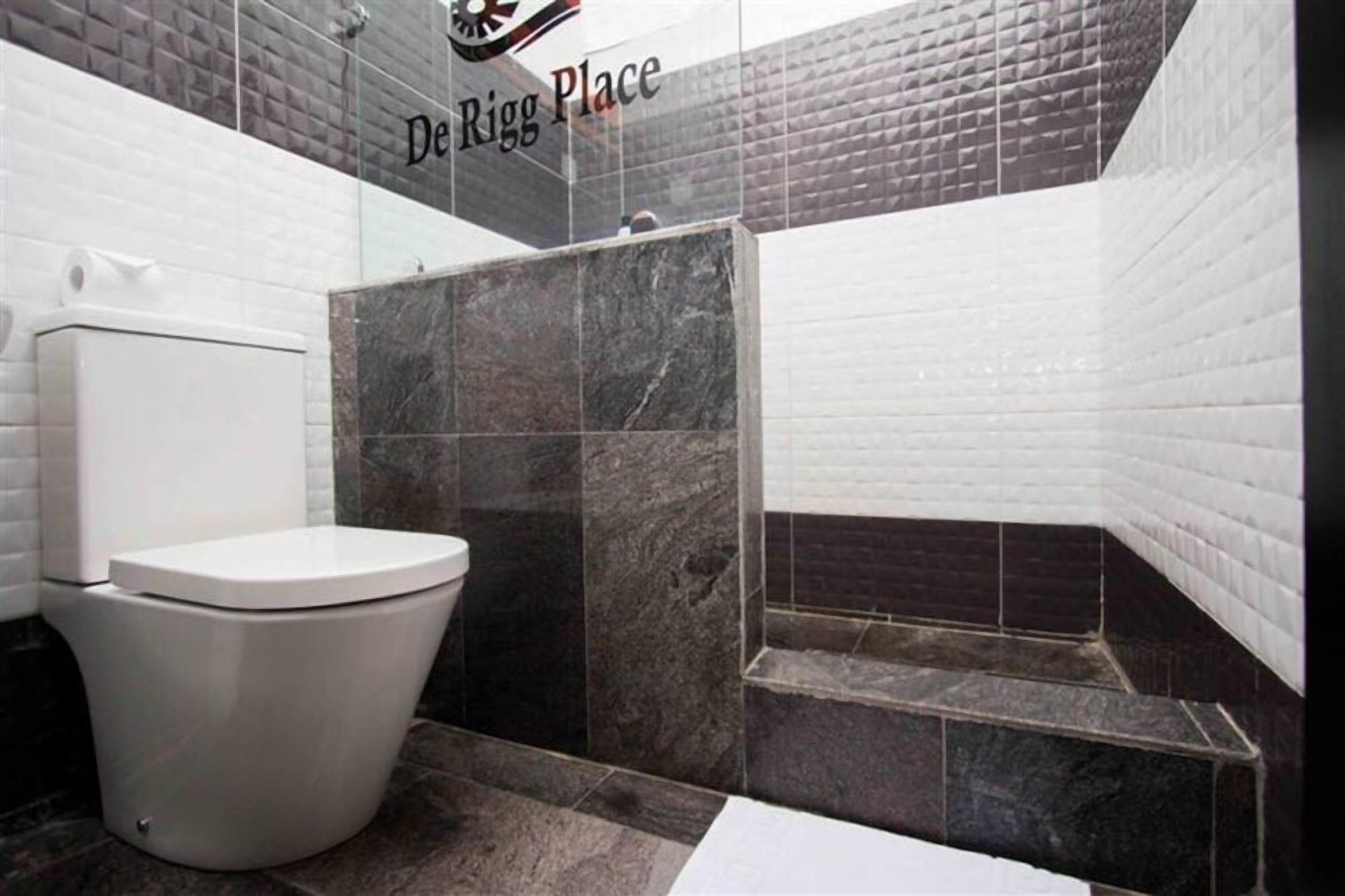 shower, free toiletries, slippers, towels