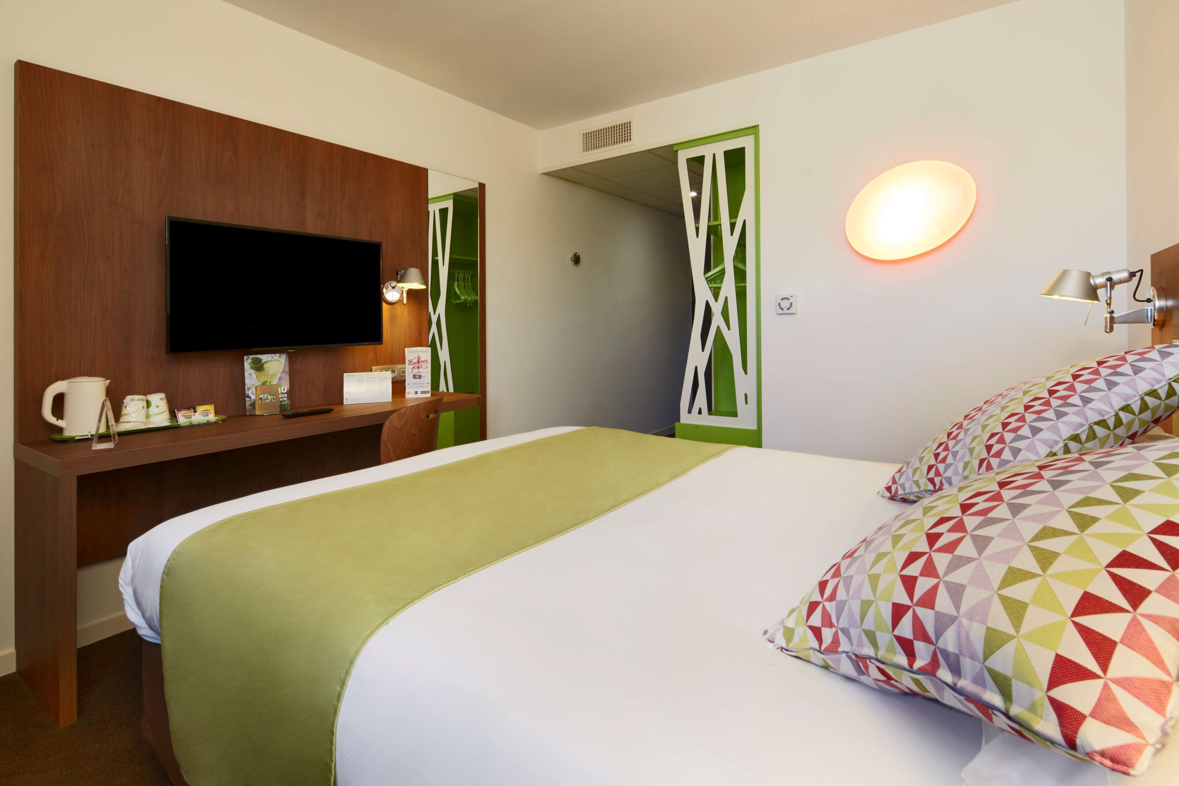 premium bedding, desk, laptop workspace, blackout curtains