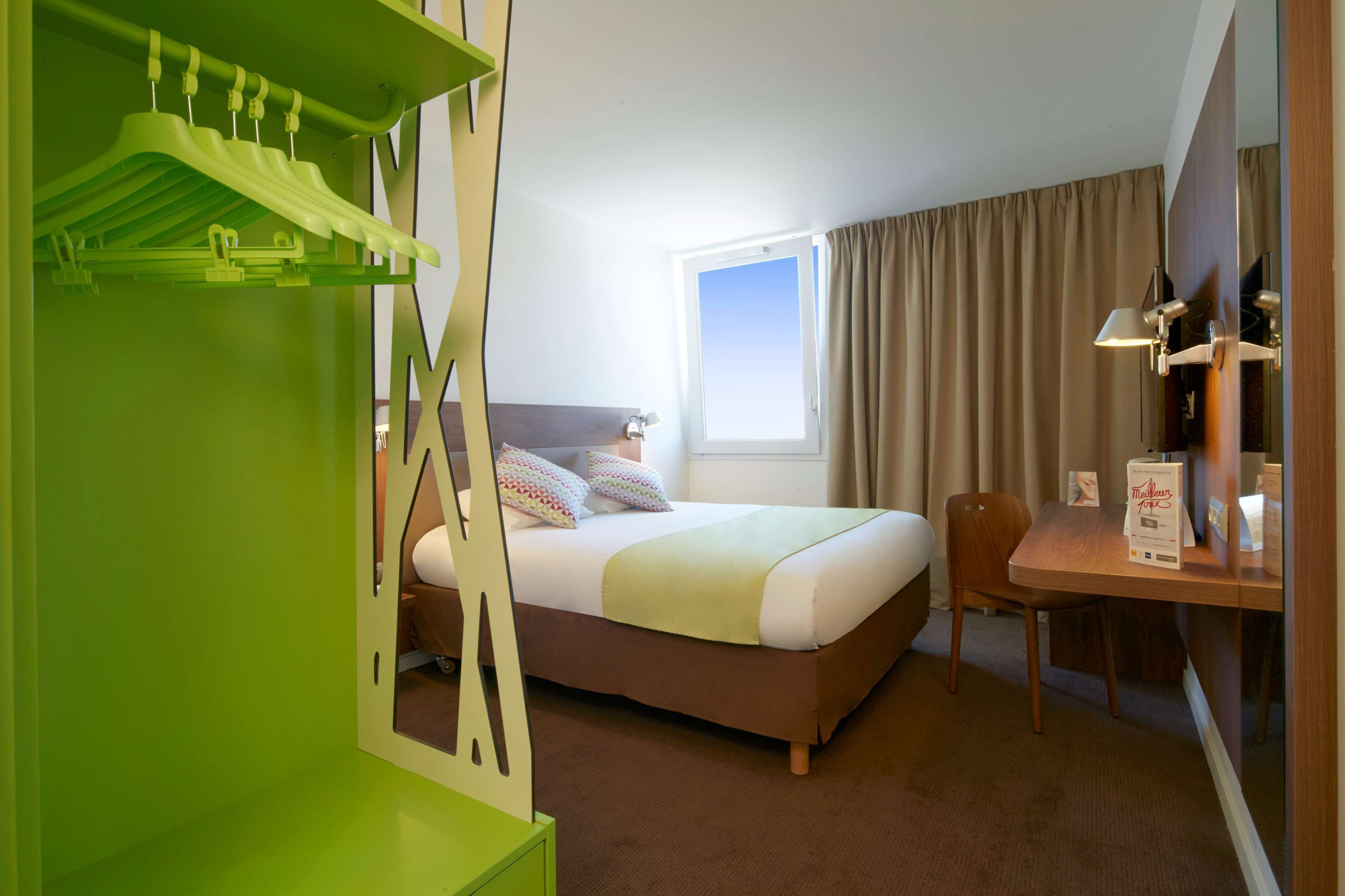 premium bedding, desk, laptop workspace, blackout curtains