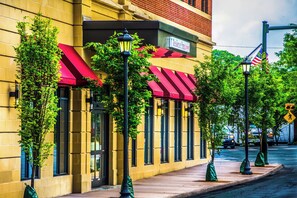 A yellow building with red awnings and a sign that reads "Residence Inn." - Residence Inn by Marriott Charlottesville Downtown (Charlottesville)