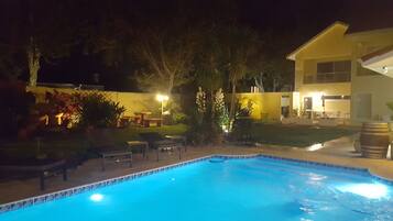 Seasonal outdoor pool, open 8:00 AM to 8:00 PM, pool umbrellas