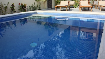 Outdoor pool, sun loungers
