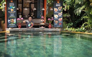 2 bars/lounges, swim-up bar, poolside bar
