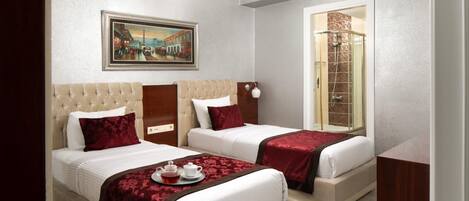 King suite | Premium bedding, minibar, in-room safe, laptop workspace
