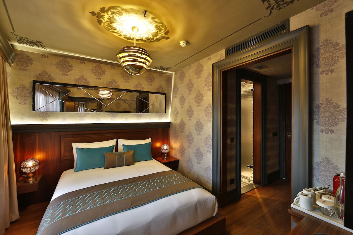 Biancheria da letto di alta qualità, minibar, cassaforte in camera