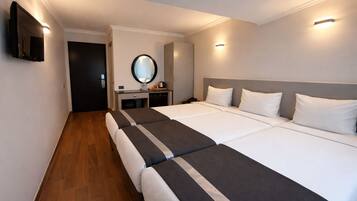 Standard Triple Room | Sengetøy av topp kvalitet, minibar, safe på rommet og lydisolert