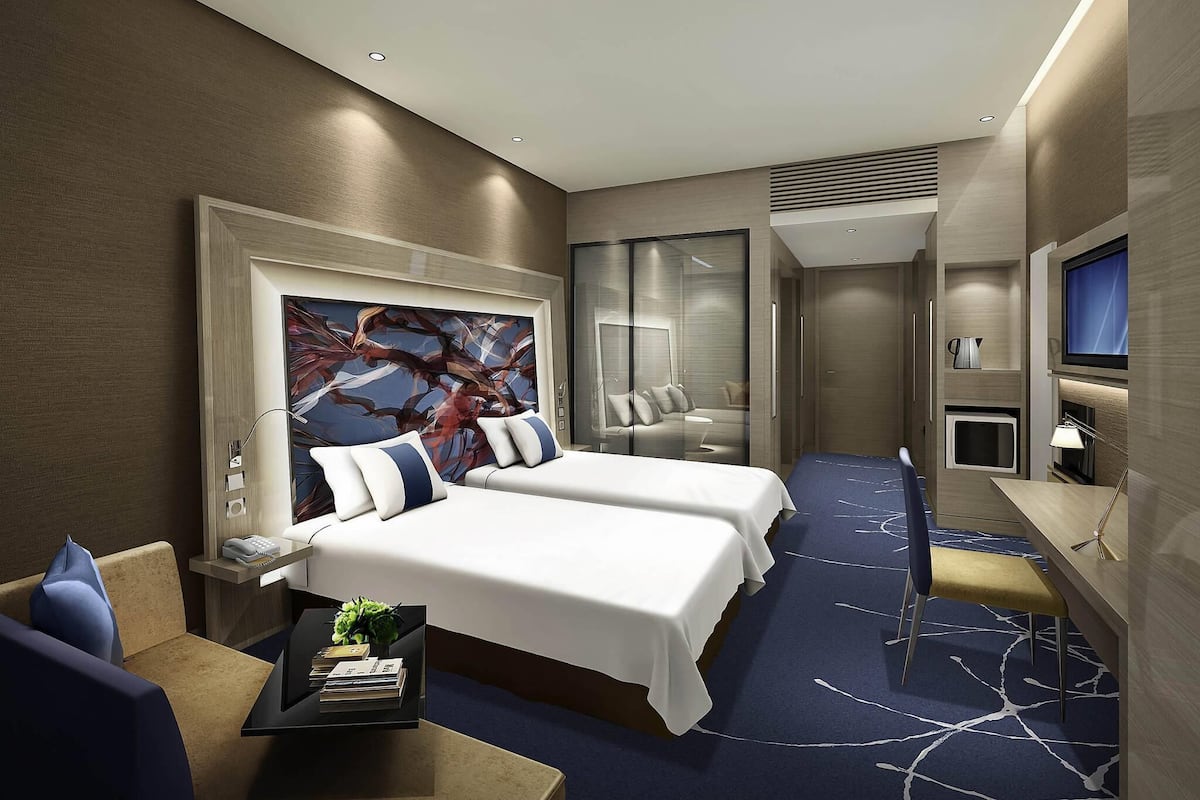 Premium bedding, in-room safe, desk, rollaway beds