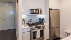 Luxury Apartment, 2 Bedrooms | Private kitchen | Coffee/tea maker, full-sized fridge, microwave - Deedees Apartments at Liberty Harbor (Jersey City)