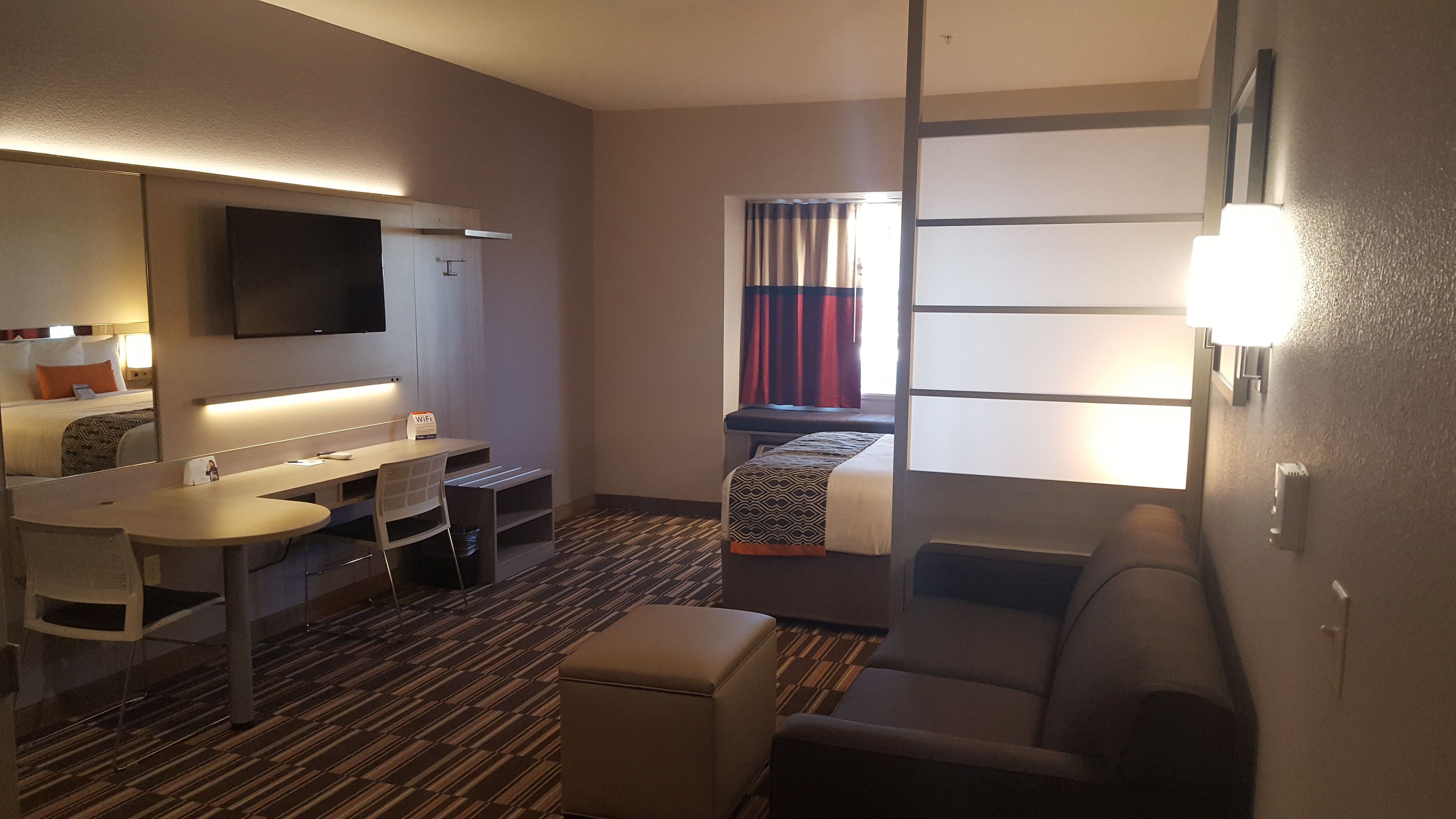 studio suite, 1 queen bed, non smoking | desk, laptop workspace, blackout curtains, iron/ironing board