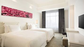 Quarto, 2 camas de solteiro | 1 quarto, roupas de cama premium, frigobar, cofres nos quartos