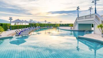 Indoor pool, outdoor pool, free pool cabanas, pool umbrellas