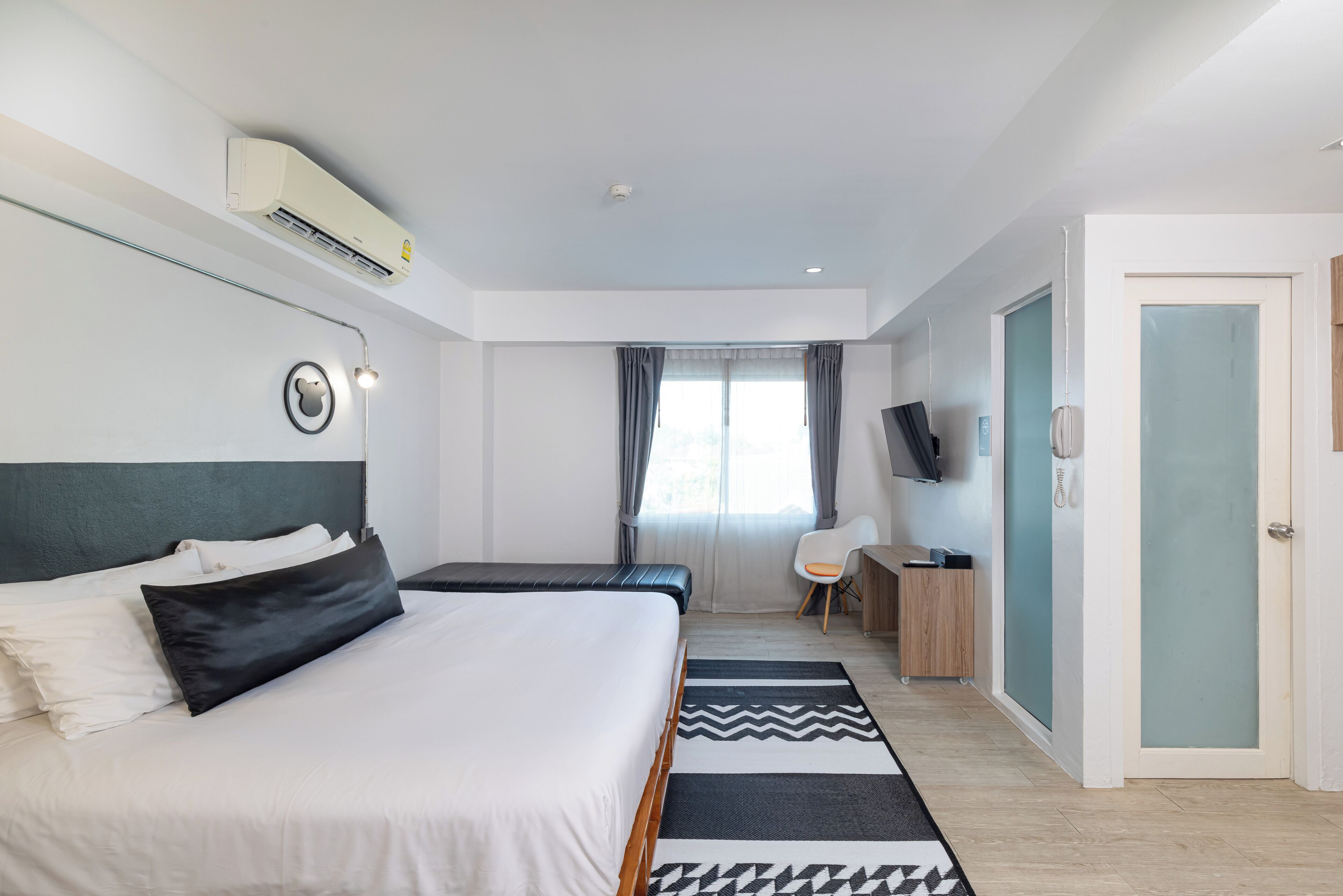 deluxe triple room | premium bedding, free minibar, in-room safe, desk