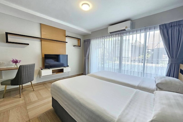 Studio, 2 Einzelbetten (Twin) | Zimmersafe, Verdunkelungsvorhänge, Bügeleisen/Bügelbrett