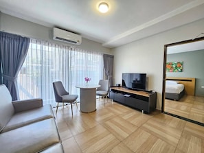 Suite, 1 Bedroom | Living area | 40-inch LED TV with cable channels, TV