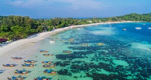 On the beach, white sand, scuba diving, snorkeling