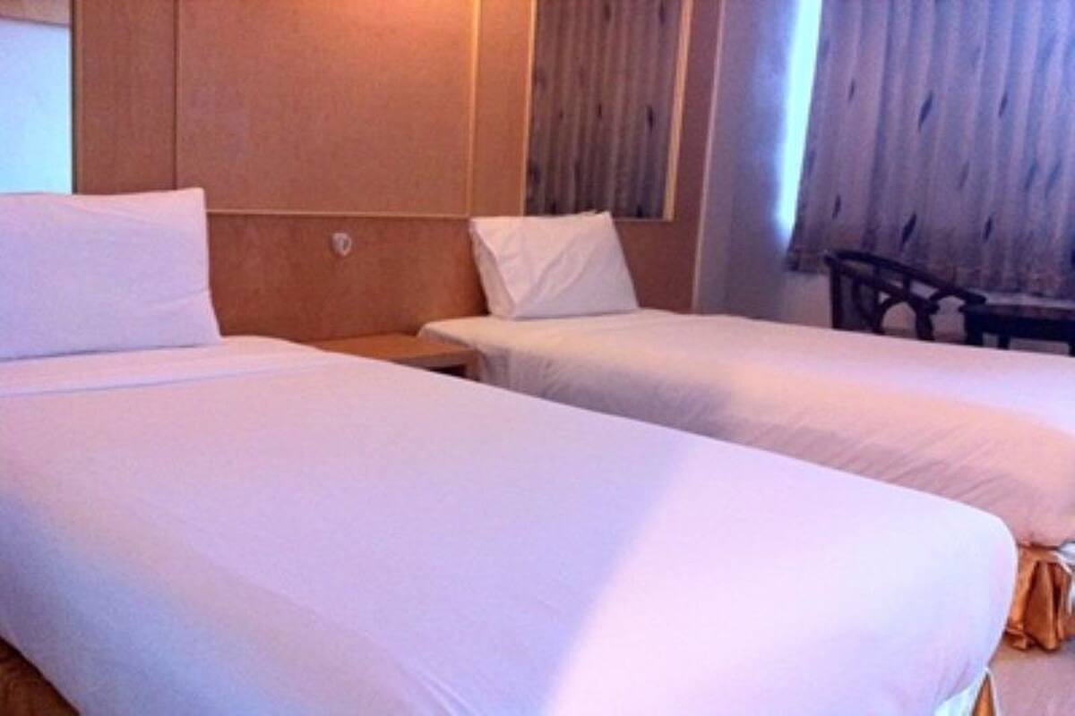 Standard Twin Room | โต๊ะทำงาน, ผ้าม่านกันแสง, เปล/เตียงเด็กอ่อน, เตียงเสริม/เปล